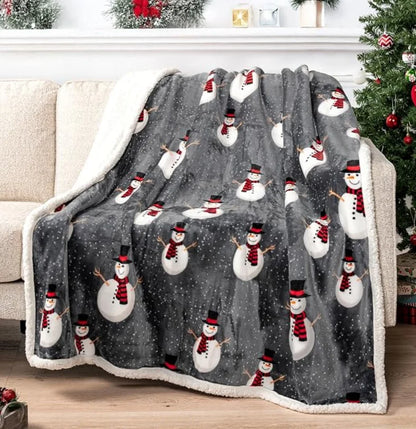 Abraço de Natal: Manta Peluciada Térmica com Estampas Festivas